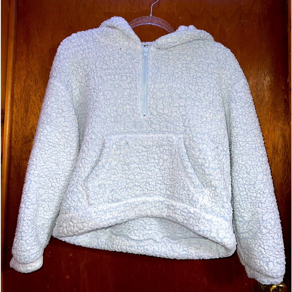 light blue sweater